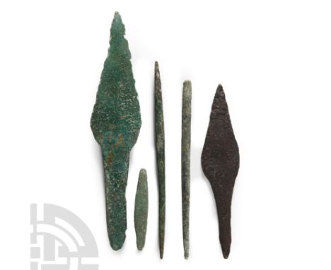 11th century B.C.-3rd century A.D.. Comprising two arrowheads with foliate head and square-sectioned tang and three awls. Cf.