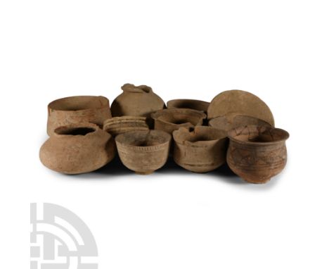 1st millennium B.C. and earlier. Fragments including carinated bowl with painted frieze to the shoulder, squat jar, cup with 