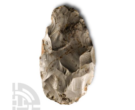 Middle Palaeolithic Period, circa 240,000- 38,000 B.P.. With curved outline to the tip, broad butt. Cf. MacGregor, A. (ed.), 