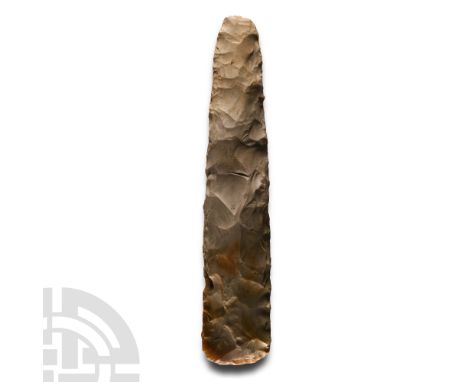 Neolithic Period, 5th-3rd millennium B.C. In amber and grey-coloured flint, bifacially knapped with convex cutting edge, slen