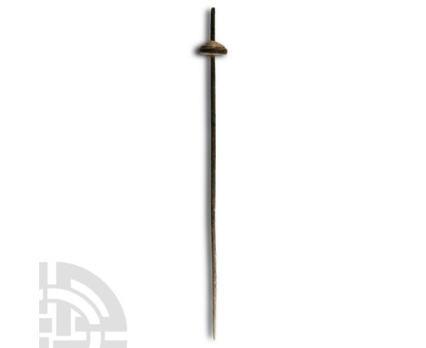 2nd millennium B.C. Distaff with spiral slot to the thicker end, separate domed whorl and tapering shank. Cf. Grütter, N., ‘S