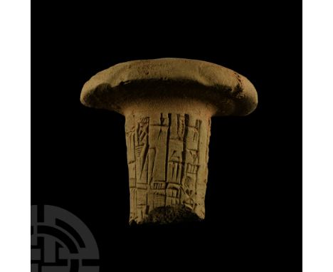 3rd-2nd millennium B.C. Conical foundation nail fragment with broad domed top, columns of cuneiform text to the shank. Cf. si