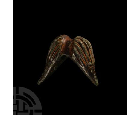 2nd century B.C.-1st century A.D.. Formed as two lateral conical bulbs connected at the base by a plain gusset; each cone wit