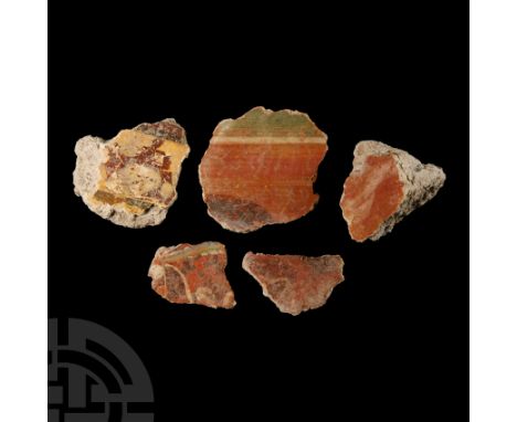 1st century A.D.. Comprising five pieces in cream, orange, blue and red with painted architectural lines; one with floral dec