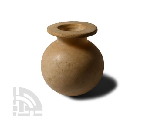 Late Old Kingdom-First Intermediate Period, circa 2513-2165 B.C. With globular body, short neck and thin, wide rim; part of t
