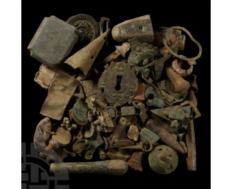 14th-20th century A.D.. Mixed group including a figural belt-buckle, scabbard chape, crotal bells, furniture fittings and oth