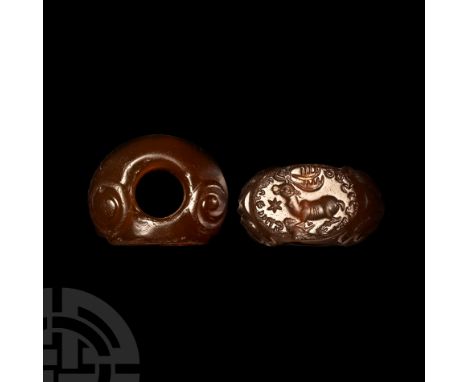 3rd-7th century A.D.. With scrolls to the shoulders, ellipsoid face with intaglio running stag, star and Pahlavi legend surro