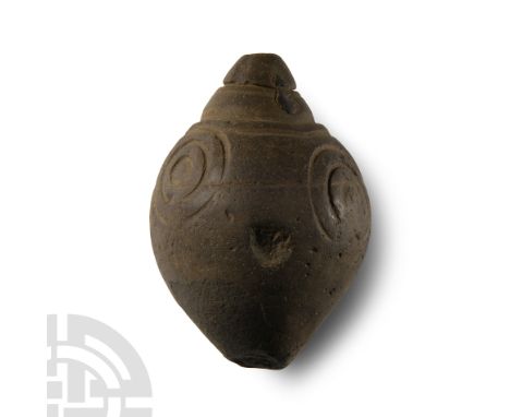 10th-13th century A.D.. Piriform body decorated with concentric circles, with sphero-conical filler-hole, intended to be fill