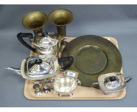 A pair of finely decorated Indian brass chargers, together with a pair of vases of the same origin, a four piece silver plate