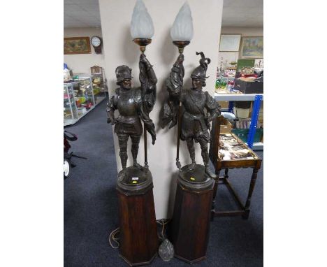 A pair of impressive spelter figure lamps of soldiers on octagonal pine plinths, lamp height 103 cm including shade 