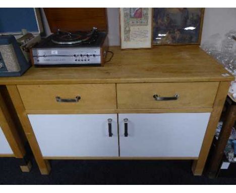 A pine Ikea work bench fitted two drawers and cupboards 