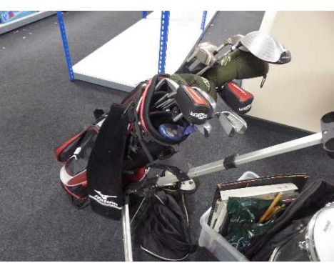 A Mizono golf bag and a part set of irons, Dunlop driver, Adams golf hybrid drivers, Ping putter etc 