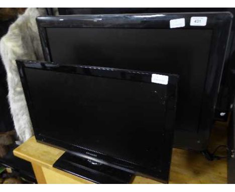 A Polaroid 22 inch LCD TV and remote & a Logik 26 inch LCD TV / DVD with remote 