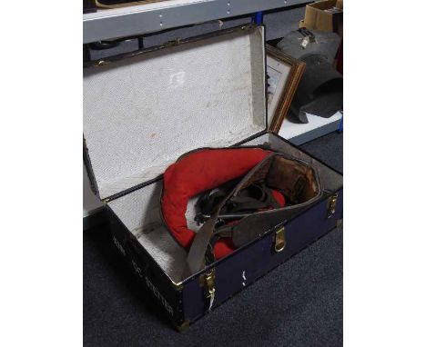 A mid 20th century trunk containing shire horse collar and tack 