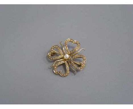 A Victorian diamond set seed pearl four leaf clover brooch, 3.6g.