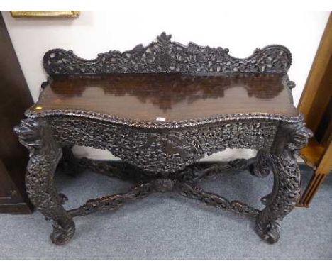 A fine Anglo Indian carved console table. width 172 cm 