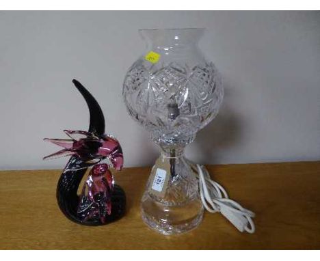 A cut glass table lamp and a decorative glass bird ornament