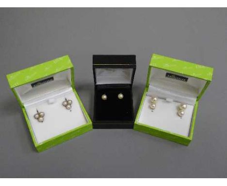 Three pairs of pearl earrings set in gold, one 18ct. (3)