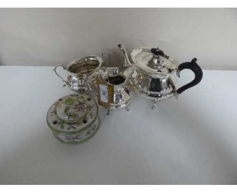 A three-piece Mappin & Webb silver plated tea service and a pottery china ink well 