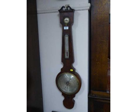 A Victorian mahogany barometer with silvered dial 