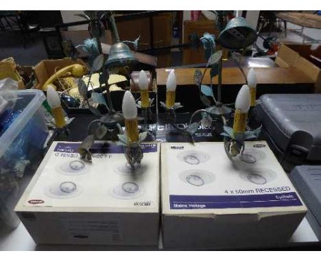 Two metal three way light fittings, two boxes of recess lights and boxed Nordic lighting kit 