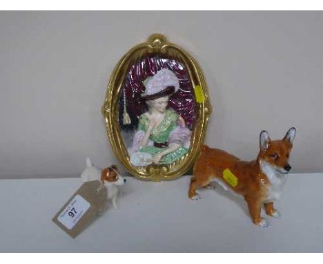 A Beswick figure of a terrier together with a Royal Doulton figure of a Corgi a Wedgwood Gainsborough relief plaque depicting