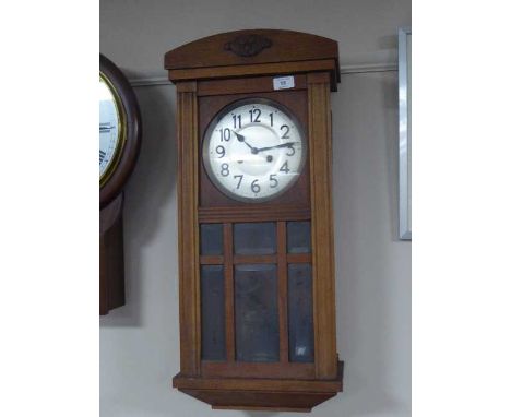 An oak cased wall clock, two framed pictures, continental figure, basket of miniature teapots and a paperweight 