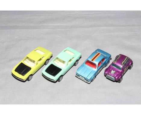 Four Corgi Juniors cars, UNLISTED colour Aston Martin DBS, Ford Escort and BVRT Racing Mini with directional stickers to RH S