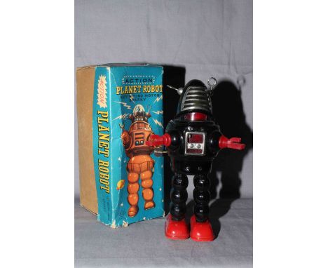 KO Toys Japan, clockwork tinplate Planet Robot.  Excellent in Good creased box, clockwork motor works.