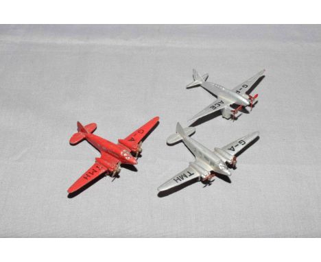 Three x Dinky Aircraft.  Two x 62m Light Transport and pre war 60g Comet.   Very Good with wear unboxed.  