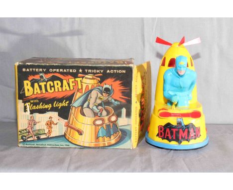 Marx battery operated Batcraft with flashing light and tricky action.   Excellent in Very Good original box.