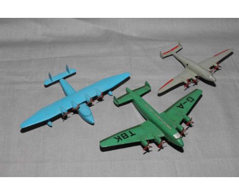Dinky 60w Flying Boat with brass roller, 62y Giant High Speed Monoplane and 62r Four Engined Liner.   Excellent unboxed.