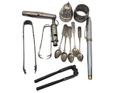 A collection of Silver, unmarked white metal and metal items. Two sugar tongs - one pair of unmarked white metal / one pair o