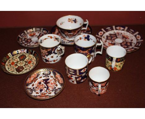 A Royal Crown Derby Imari trio, a Samson Hancock Imari coffee can and saucer a further matching coffee can and two other Imar