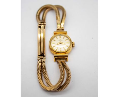 Ladies Vintage Gold Plated Omega with 9ct Gold Watch Bracelet  The Omega Watch face is hallmarked with the Omega horseshoe lo