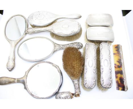 Selection Sterling Silverware. To include; two Hand Brushes, two Clothes Brushes engraved with Initials "GAW", two rectangula