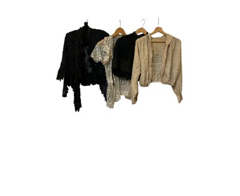 A group of vintage and antique fashions to include two Victorian capes, one an1880s mourning cape in silk grosgrain and mourn