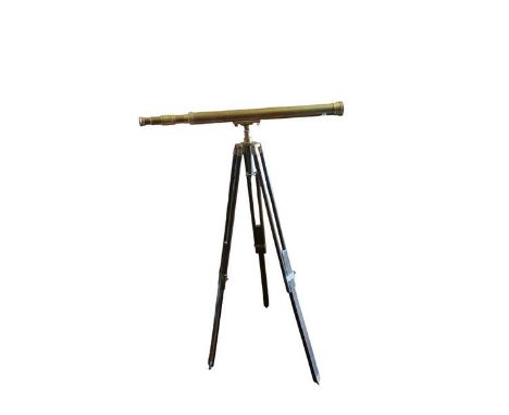 A 20th century adjustable brass telescope on tripod stand. 147cm high, telescope 100cm long. (1)
