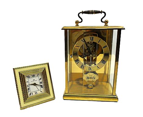 A Matthew Norman strut/alarm clock and an Acctim brass mantel clock (2)