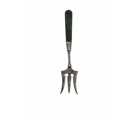 A Fern engraved Silver bread fork with a green nephrite Jade handle. Marked New Zealand to the front and Stirling and makers 