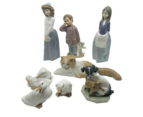Eight Nao pieces to include a Nao dog and cat, three Nao ducks, Nao figure&nbsp; (8)