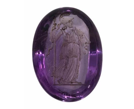 A large natural cabochon amethyst Intaglio - delicately carved and depicting the Goddess Athena - Goddess of Wisdom carrying 