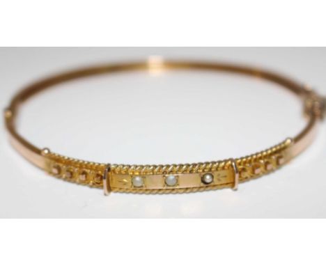 ***RE-OFFER February Jewellery and Antique Auction &pound;150-&pound;200***


Vintage 9ct Gold Seed Pearl Half Hinged Bangle 
