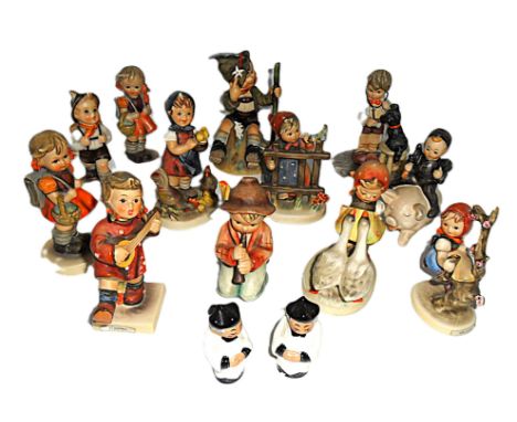 A group of fourteen various Hummel (Goebel) figures
