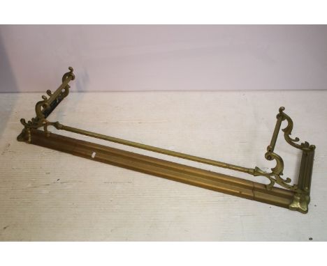 20th century brass fender fire surround with scrolled end detail, H 28cm, W 134cm, D 35cm