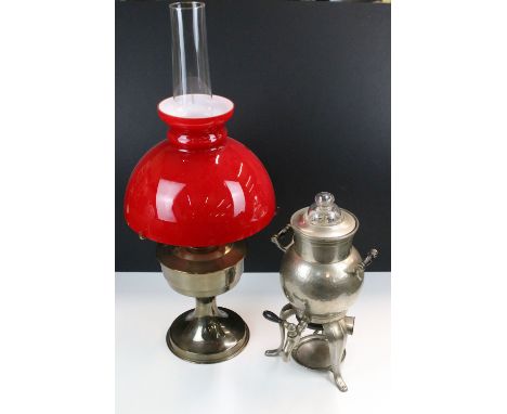 23 Aladdin oil lamp with red glass shade and glass chimney together with a silver metal coffee maker percolator 