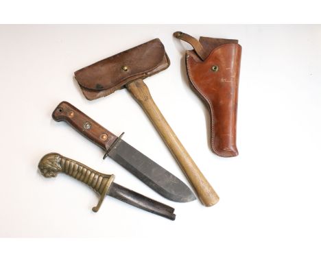 A small group of collectables to include a Military knife, gun holster, hand axe within keather cover and sword handle.