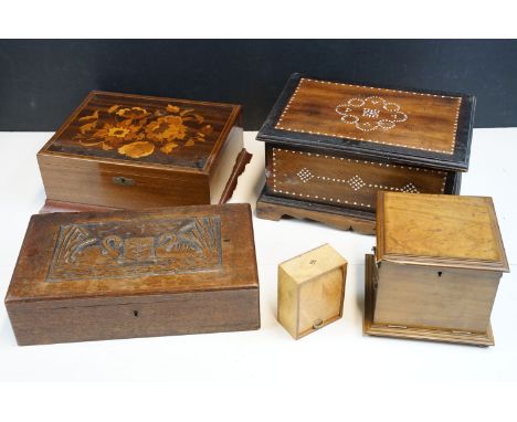 Collection of four boxes, comprising: an early 20th century walnut cantilevered box, opening to three drawers, raised on bun 