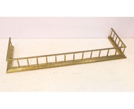 Brass barley twist detail fender fire surround, H 19cm, W 145cm, D 46cm