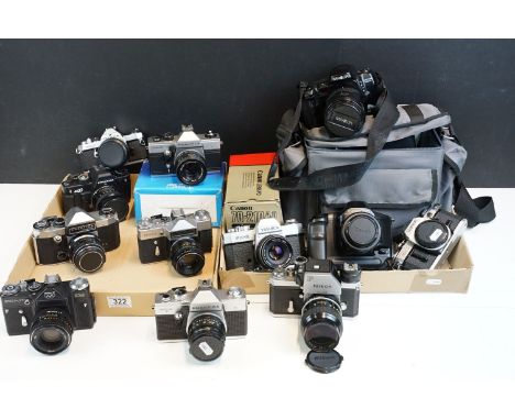 Eleven 35mm SLR cameras and fourteen lenses Featuring a Nikon F fitted with a 105mm f/2.5, Canon AE1. Pentax ME, Yashica FX-2